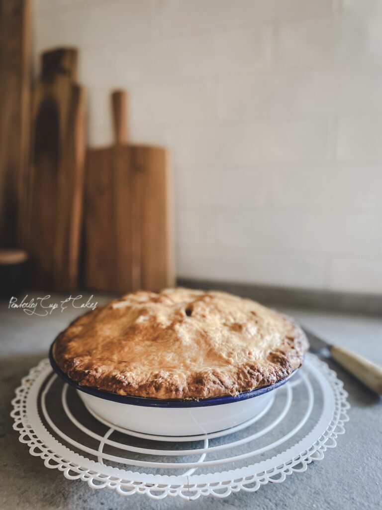 Apple pie in cooling rack